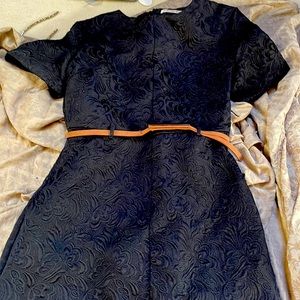 This adorable boutique dress is perfect for any occasion! It comes with a belt!